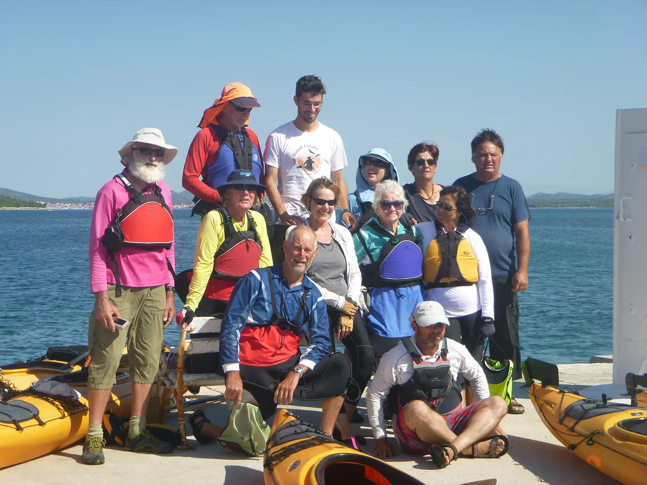 group of person with sea kayak