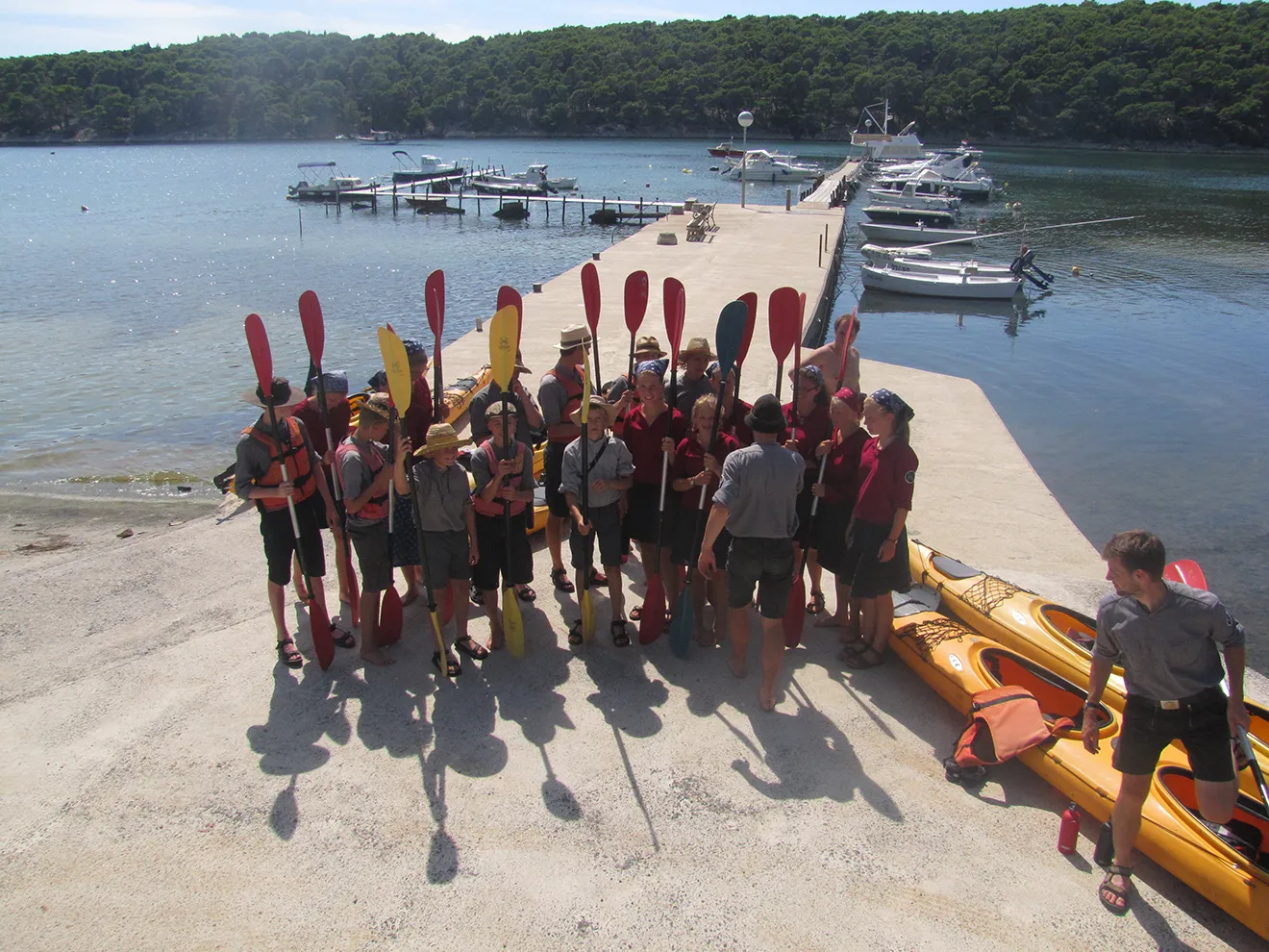 group of person with sea kayak