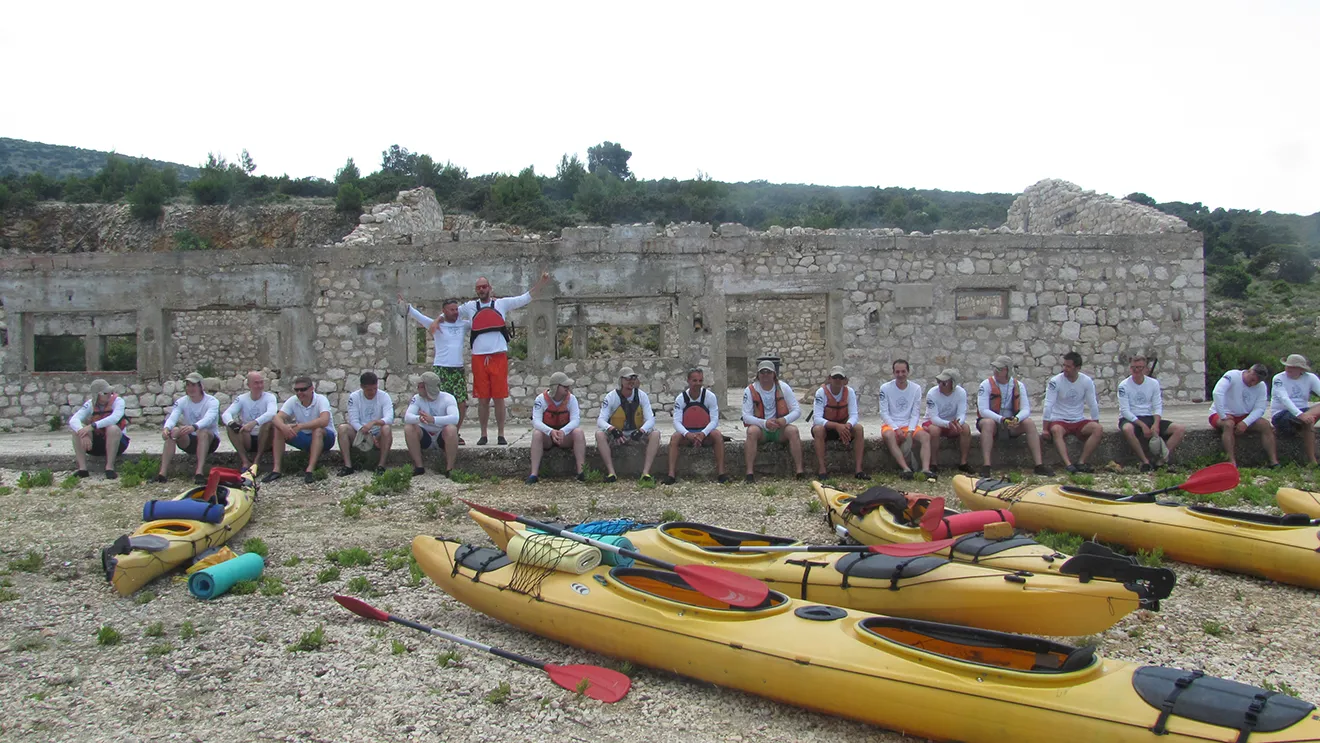 group of person with sea kayak